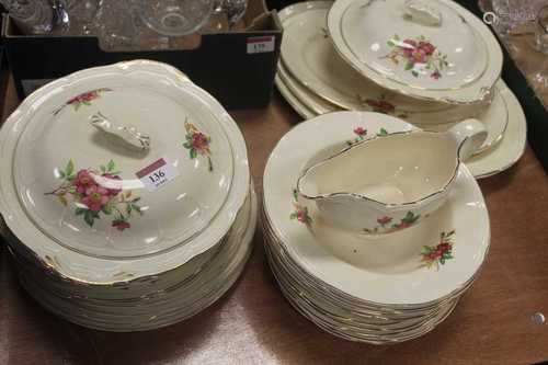 A Royal Art Pottery part dinner service, on a cream ground w...