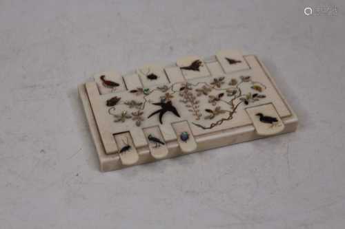 A Japanese Meiji period ivory shibayama cribbage scorer, 9cm