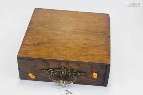 An oak box, of rectangular form, having a sliding lid with b...