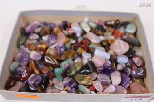 A collection of small polished hardstones, to include agate,...