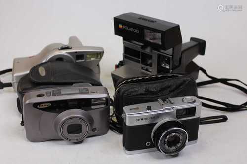 A Polaroid Sun 600 LMS camera, cased, together with another ...