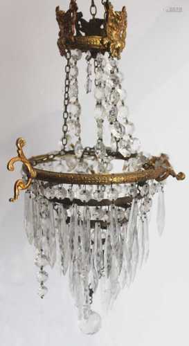 An early 20th century gilt metal five-tier ceiling light pen...