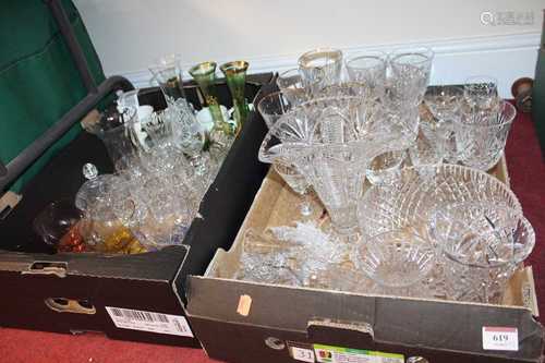 Two boxes of cut and coloured glassware to include vases, dr...