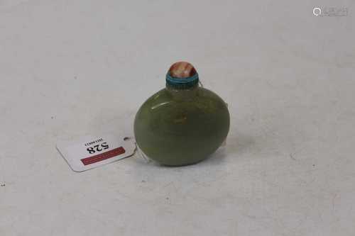 A Chinese carved celadon snuff bottle and cover 6.5cm