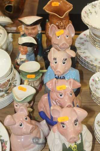 A set of five Wade Natwest pig money-boxes; together with a ...