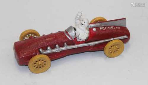 A reproduction cast metal and painted motor car advertising ...