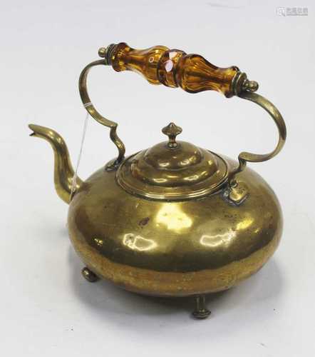 An early 20th century brass kettle, of squat circular form, ...