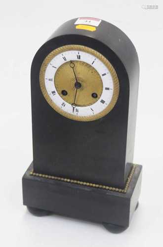 A 19th century black slate mantel clock, of lancet shape, ha...