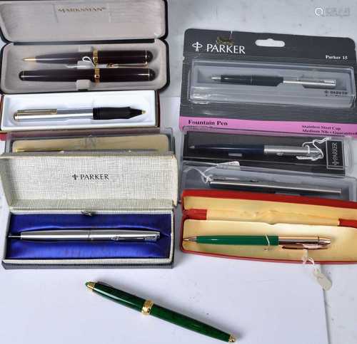 A collection of fountain and ball point pens to include Park...