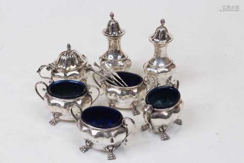 A set of four Edwardian silver open salts, each of bombe for...