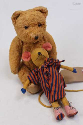 A mid-20th century blond horsehair stuffed teddy-bear, with ...