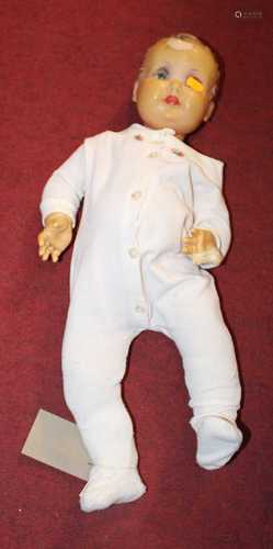 A late 20th century celluloid doll