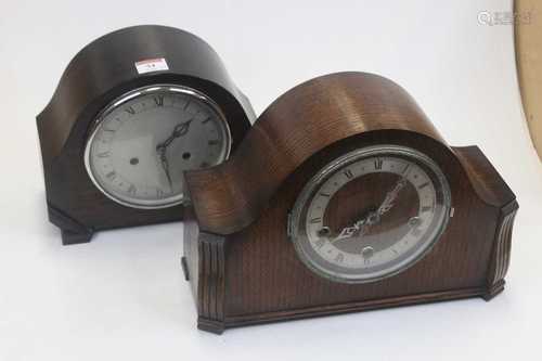 A 1950s oak cased mantel clock, having a silvered chapter ri...