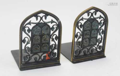 A pair of Israeli book-ends, each of arched form with fruiti...