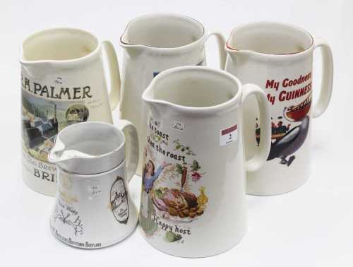 A collection of transfer printed advertising water jugs, to ...