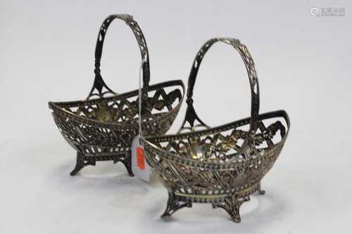 A pair of late 19th century German silver sweetmeat baskets,...