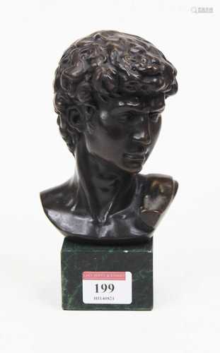 A reproduction bronzed head and shoulders bust of David, on ...