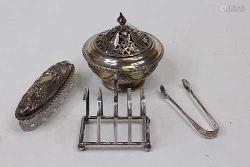 An early 20th cenutry silver pot pourri, the domed removable...