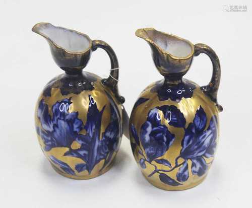 A pair of circa 1900 Thomas Forrester & Sons ewers, each bod...