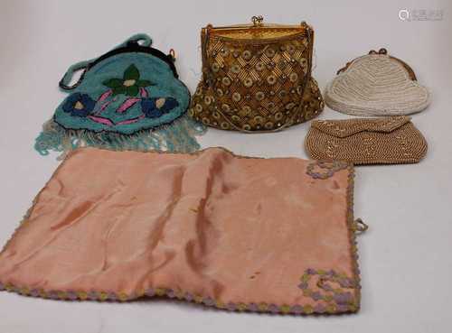 A small collection of early 20th century lady's beadwork pur...