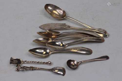 A George V silver basting spoon; together with a matching si...