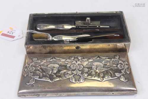 A circa 1900 silver clad travel case, of rectangular form, t...