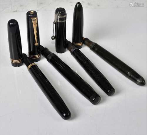 A collection of four Swan Mabie Todd fountain pens, comprisi...