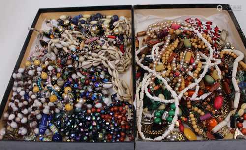 A box of assorted costume jewellery, to include various bead...