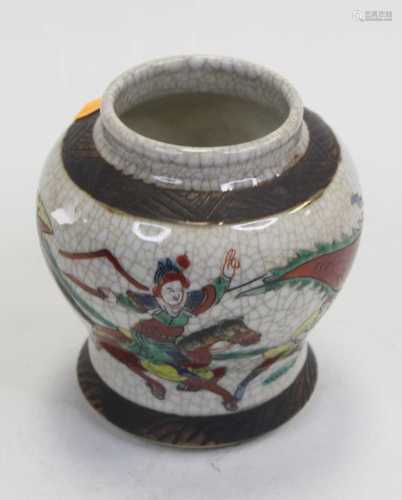 A Japanese crackle-glazed ginger jar, of squat baluster form...