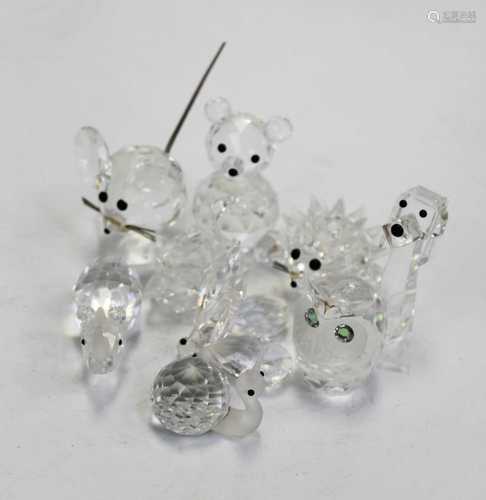 A small collection of Swarovski crystal ornaments, mainly be...