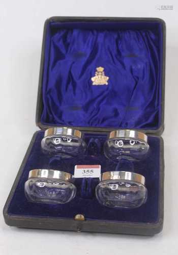 A set of four late Victorian glass open salts, each having a...