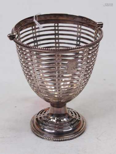 A George V silver basket, of bell shape, with pierced banded...