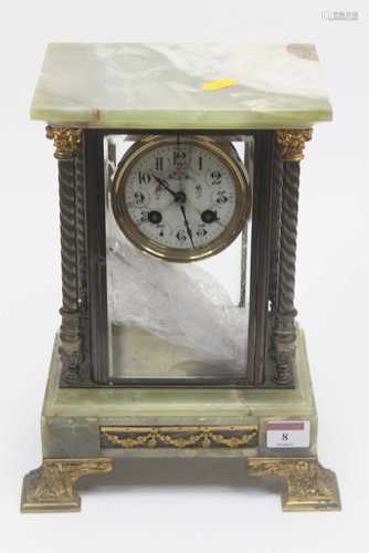 A 19th century onyx and gilt metal mounted four glass mantel...