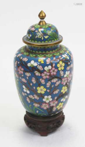 A 20th century Japanese cloisonné vase and cover, on a blue ...