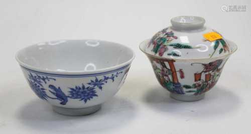 A Chinese export bowl, underglaze blue decorated with a bird...