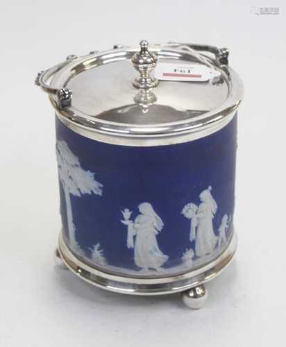 A Wedgwood blue jasperware biscuit barrel, having silver pla...