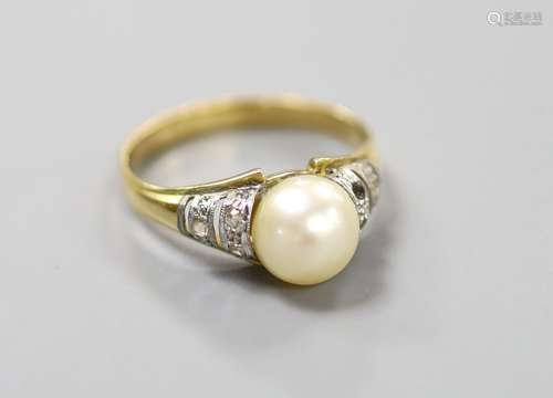 A modern yellow metal, cultured pearl and gem set ring, size...