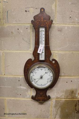 A late 19th century mahogany and inlaid wheel barometer / th...