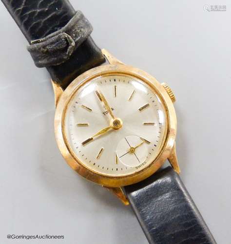 A lady's 9ct gold Tudor manual wind wrist watch, with subsid...