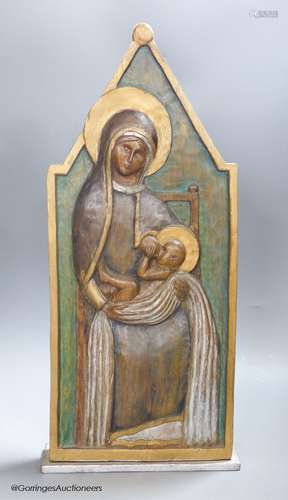 A late 20th century carving of the Madonna and Child, signed...