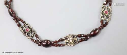 An early 20th century white metal, garnet and red paste? set...