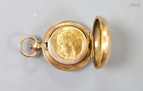 A 9ct gold sovereign case, with engraved monogram, 30mm, gro...