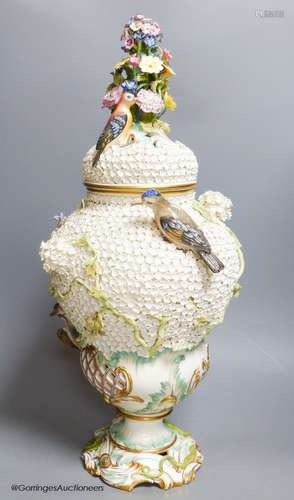 A large 19th century Continental porcelain floral encrusted ...