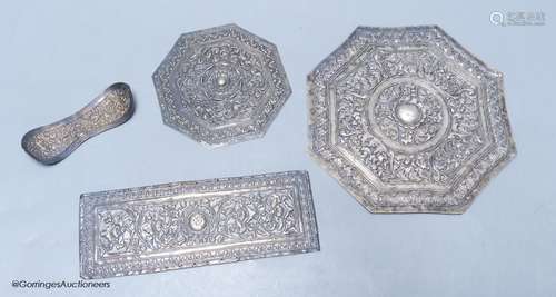 Three Malay Straits white metal 'buntal' or pillow ends,two ...