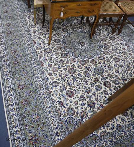 A North West Persian ivory ground carpet, 350 x 250cm