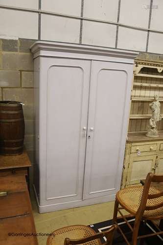 A Victorian painted two door pine wardrobe, width 128cm dept...