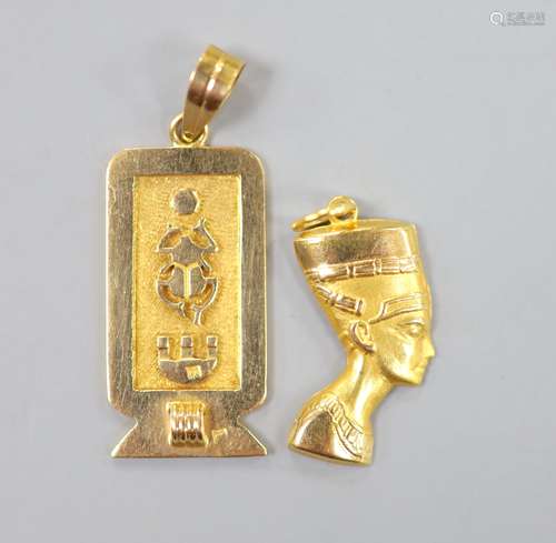 Two Egyptian gold charms (tested as 18ct), gross 6.3 grams.