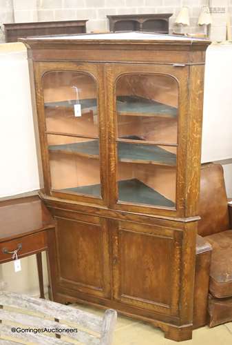 A 19th century oak standing corner cupboard, length 112cm, d...