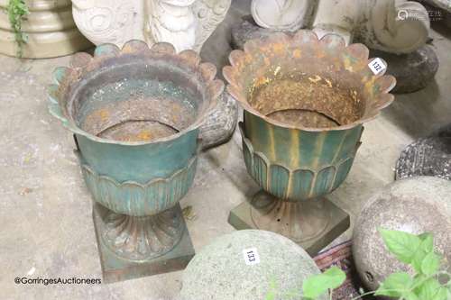 A pair of Victorian painted cast-iron garden urns, diameter ...