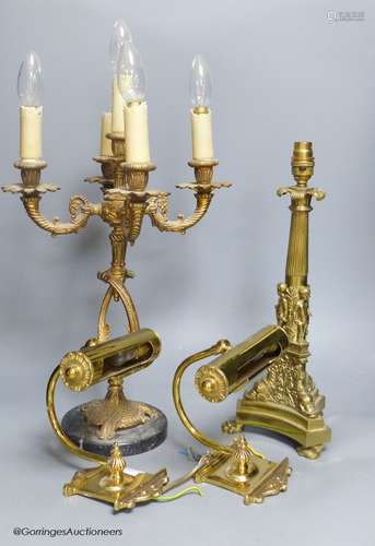 A figural cast brass table lamp, a pair of Art Deco wall lam...